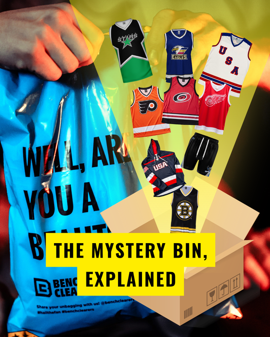 The Mystery Bin, explained — a Bench Clearers mystery bag bursting with team tanks, hoodies and shorts — photo 1 of 7