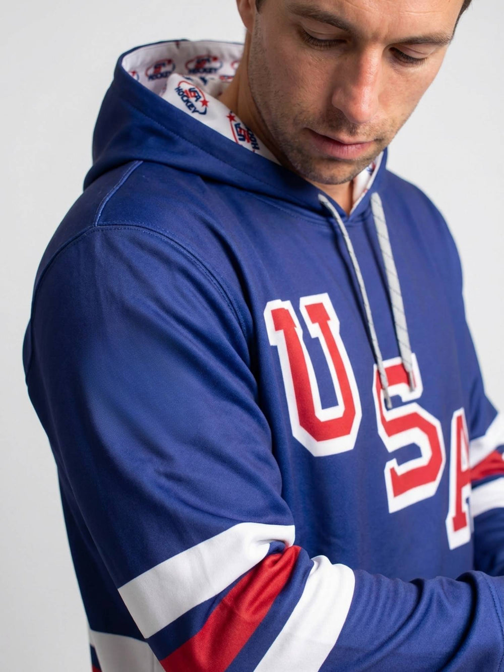 USA Hockey Nations 2026 Navy Hockey Hoodie - MODEL SIDE | BenchClearers Hockey Apparel