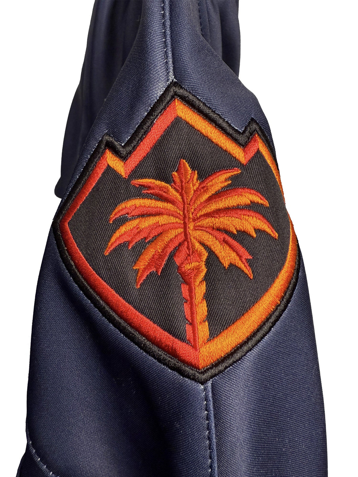 Embroidered shoulder patch on a hockey lace hoodie