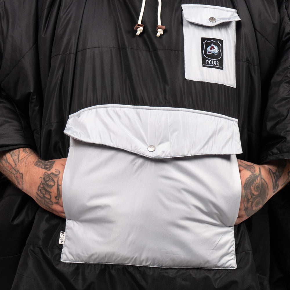 Oversized handwarmer pocket on an insulated hockey poncho