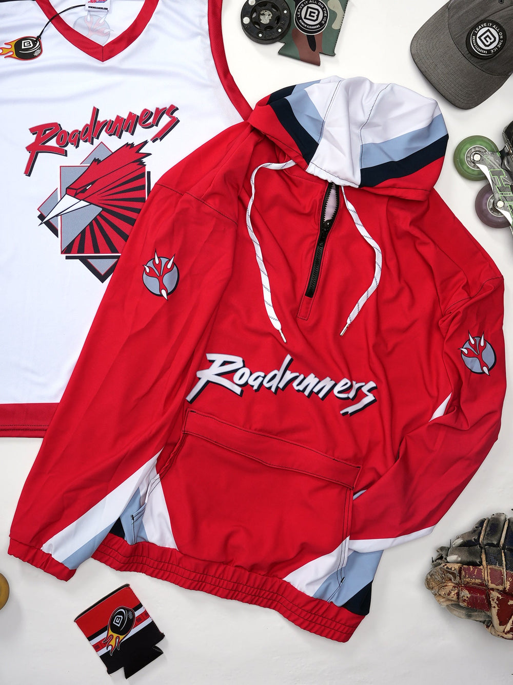 Montreal Roadrunners hockey windbreaker laid flat with hockey gear