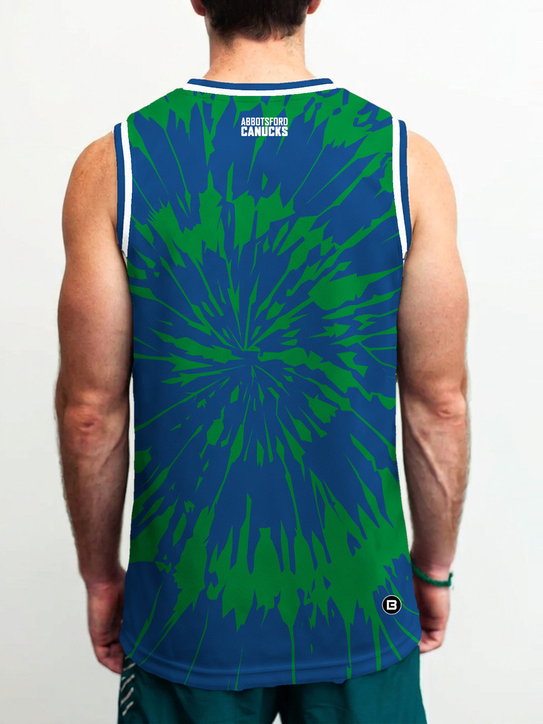 Model wearing the Bench Clearers Abbotsford Canucks Tie-Dye Hockey Tank - back view