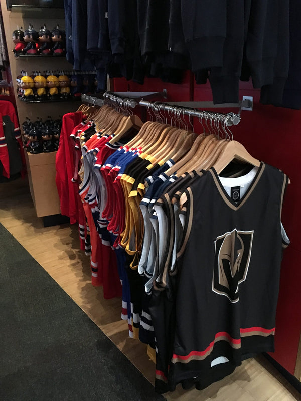 Rack of Bench Clearers NHL hockey tanks at the Hockey Hall of Fame store