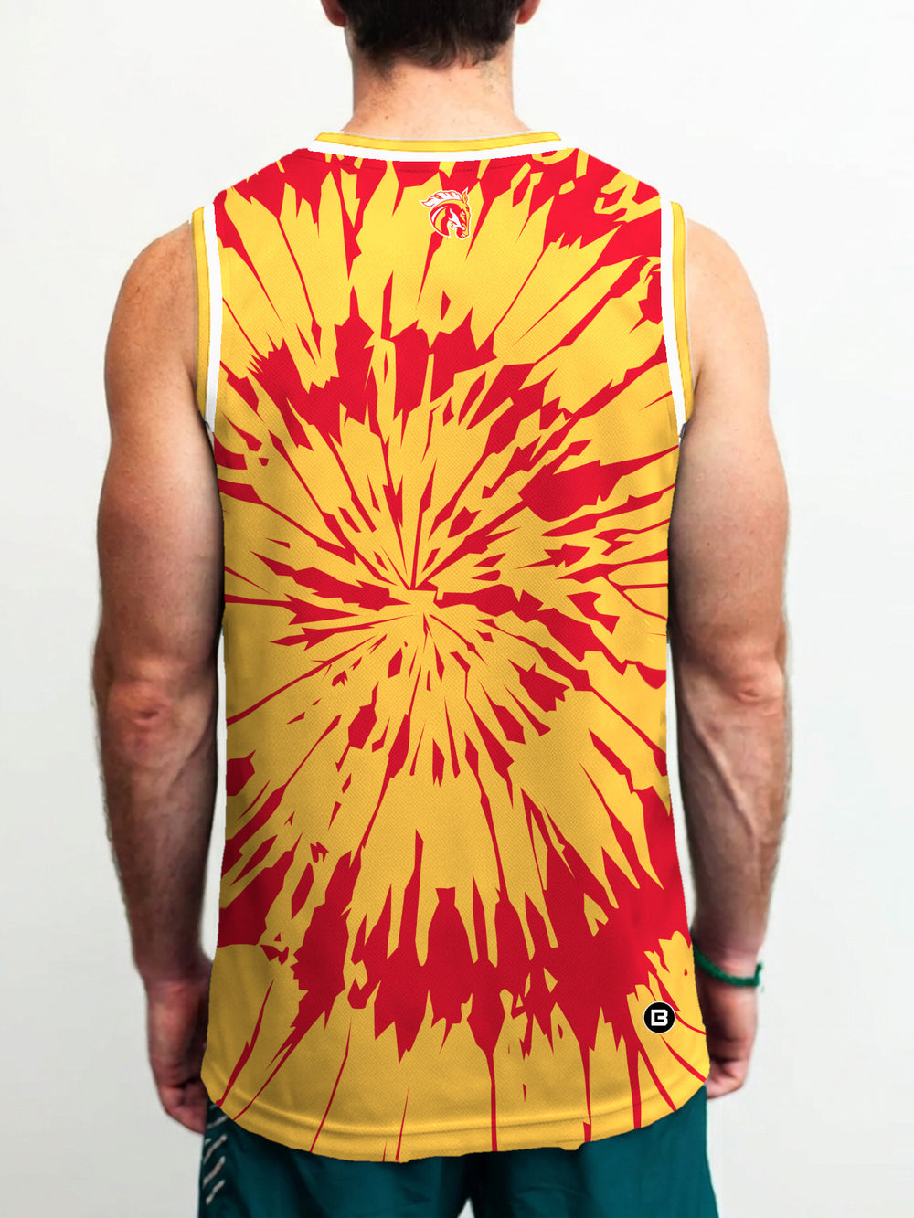 Model wearing the Bench Clearers Calgary Wranglers Tie-Dye Hockey Tank - back view