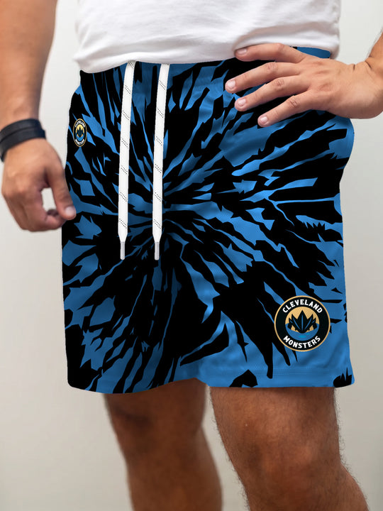 Model wearing the Bench Clearers Cleveland Monsters Tie-Dye Hockey Shorts - front view