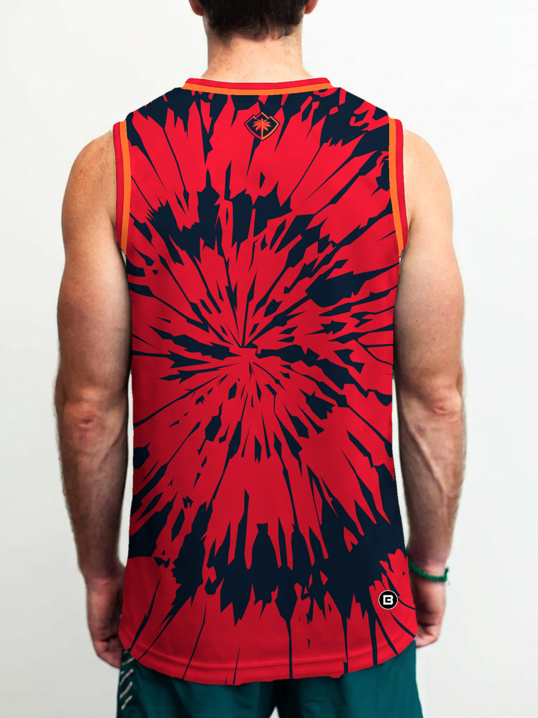 Model wearing the Bench Clearers Coachella Valley Firebirds Tie-Dye Hockey Tank - back view