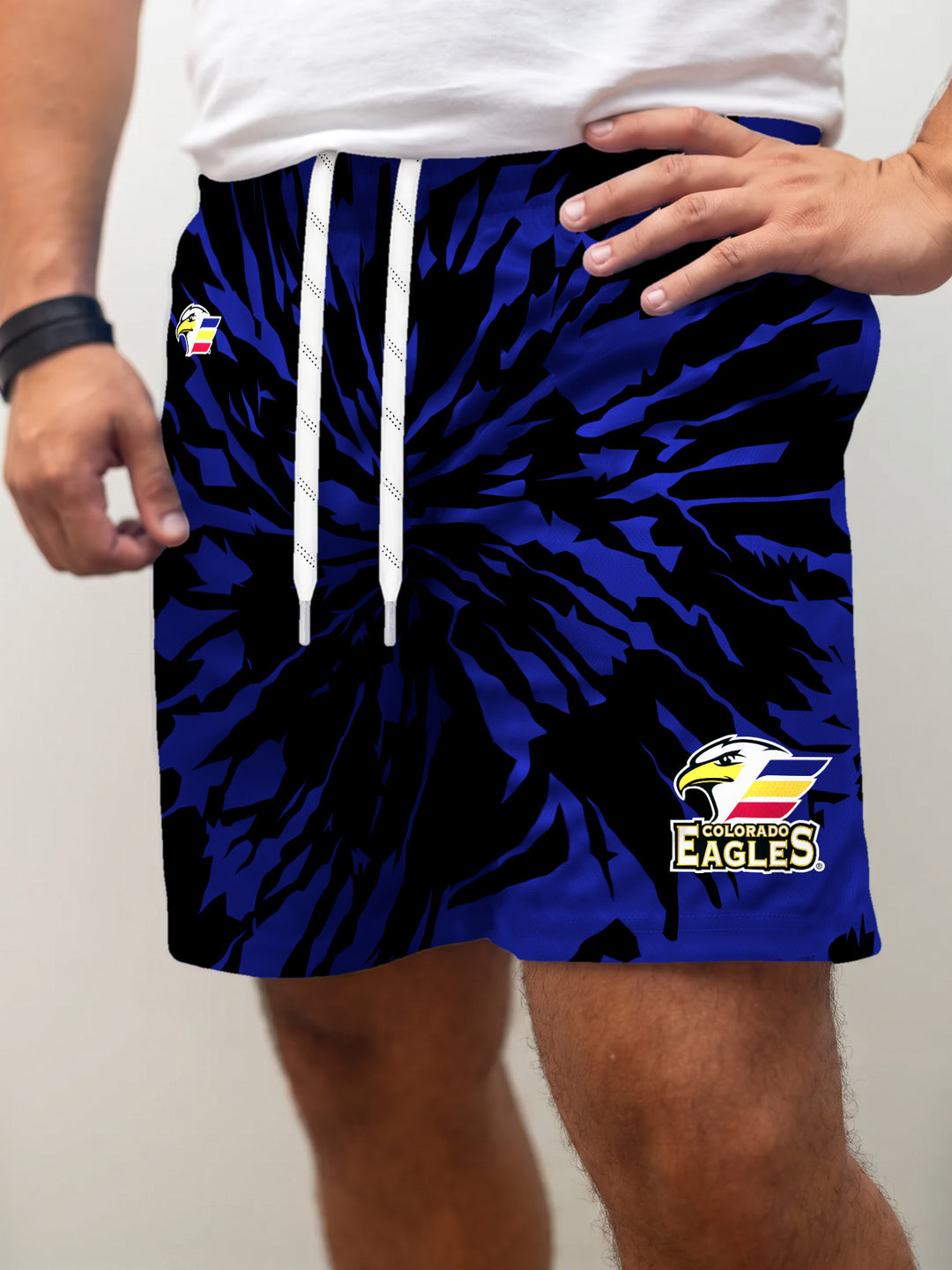 Model wearing the Bench Clearers Colorado Eagles Tie-Dye Hockey Shorts - front view