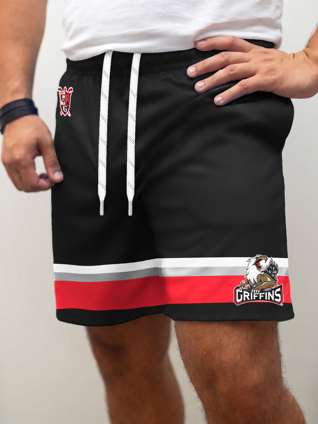 Model wearing the Bench Clearers Grand Rapids Griffins Hockey Shorts - front view