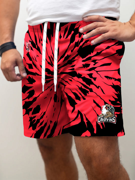Model wearing the Bench Clearers Grand Rapids Griffins Tie-Dye Hockey Shorts - front view