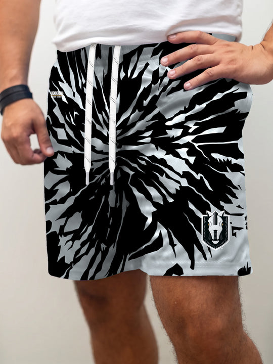 Model wearing the Bench Clearers Henderson Silver Knights Tie-Dye Hockey Shorts - front view