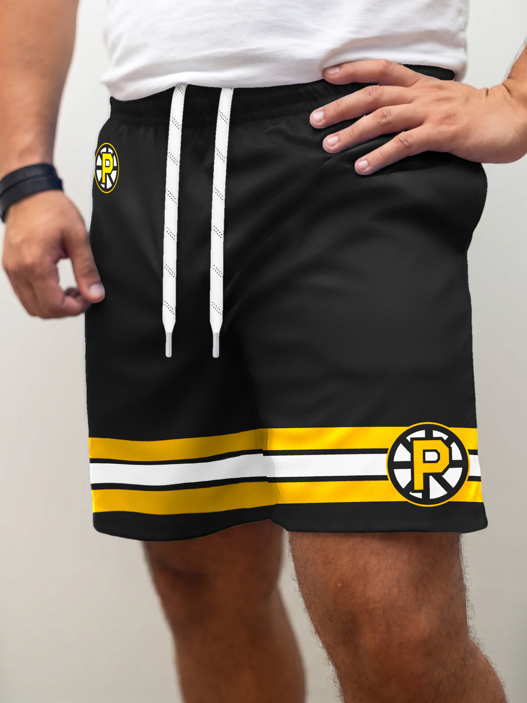 Model wearing the Bench Clearers Providence Bruins Hockey Shorts - front view