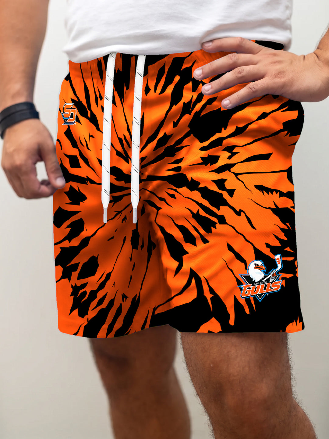 Model wearing the Bench Clearers San Diego Gulls Tie-Dye Hockey Shorts - front view