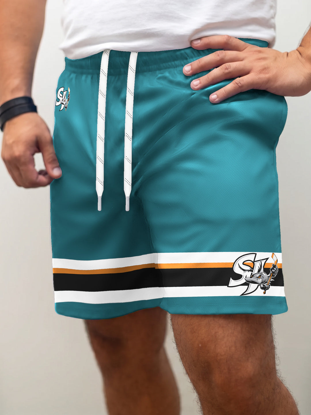 Model wearing the Bench Clearers San Jose Barracuda Teal Alternate Hockey Shorts - front view