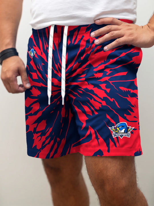 Model wearing the Bench Clearers Springfield Thunderbirds Tie-Dye Hockey Shorts - front view