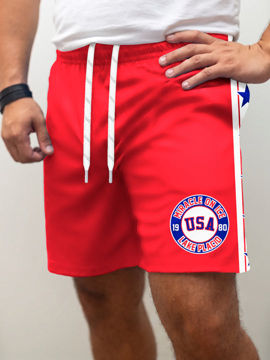 Model wearing the Bench Clearers USA Hockey Miracle on Ice 1980 Red Hockey Shorts - front view