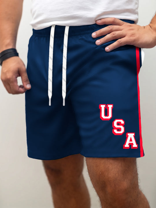 Model wearing the Bench Clearers USA Hockey Navy Blue Hockey Shorts - front view