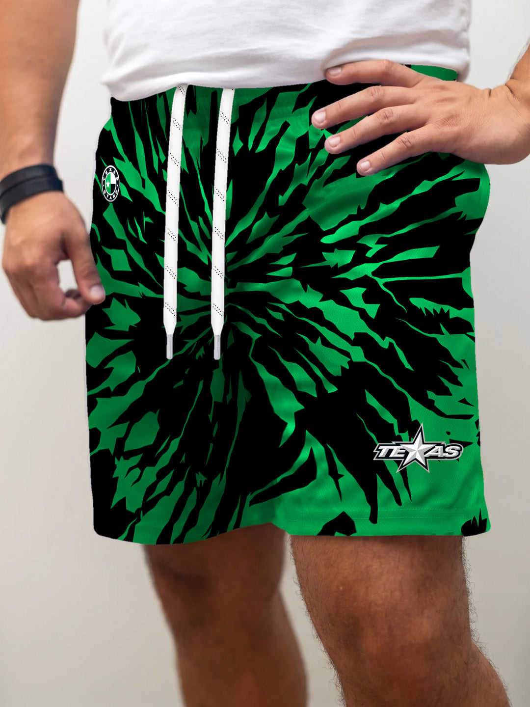 Model wearing the Bench Clearers Texas Stars Tie-Dye Hockey Shorts - front view